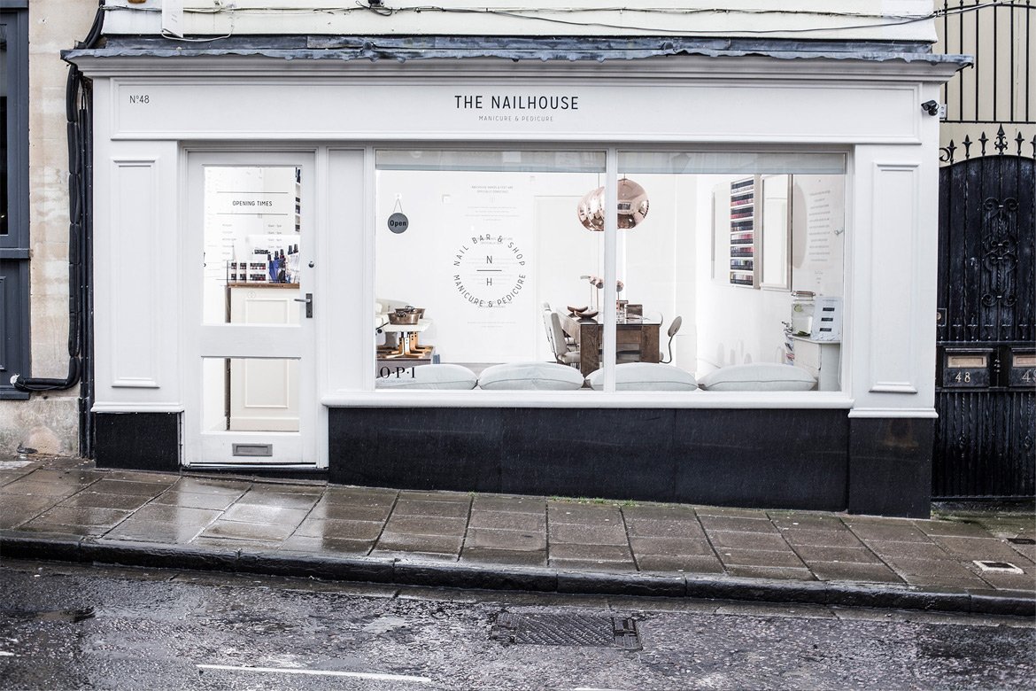 Shop front with interior lighting of The Nail House, Clifton Village, Bristol - By Paris Penny - Commercial photographer Bristol