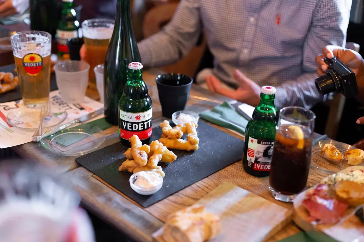 photograph of food and beer bottle at a vedette event photographed Bristol Photographer Paris Penny